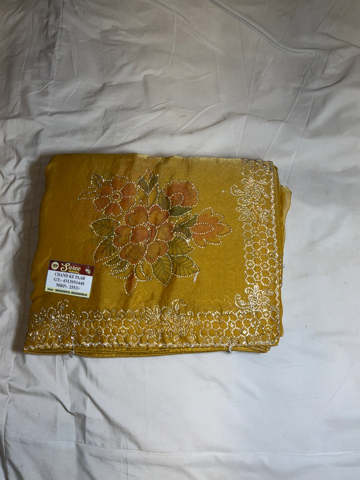 Embellished Metallic Silk Saree with Floral Mot