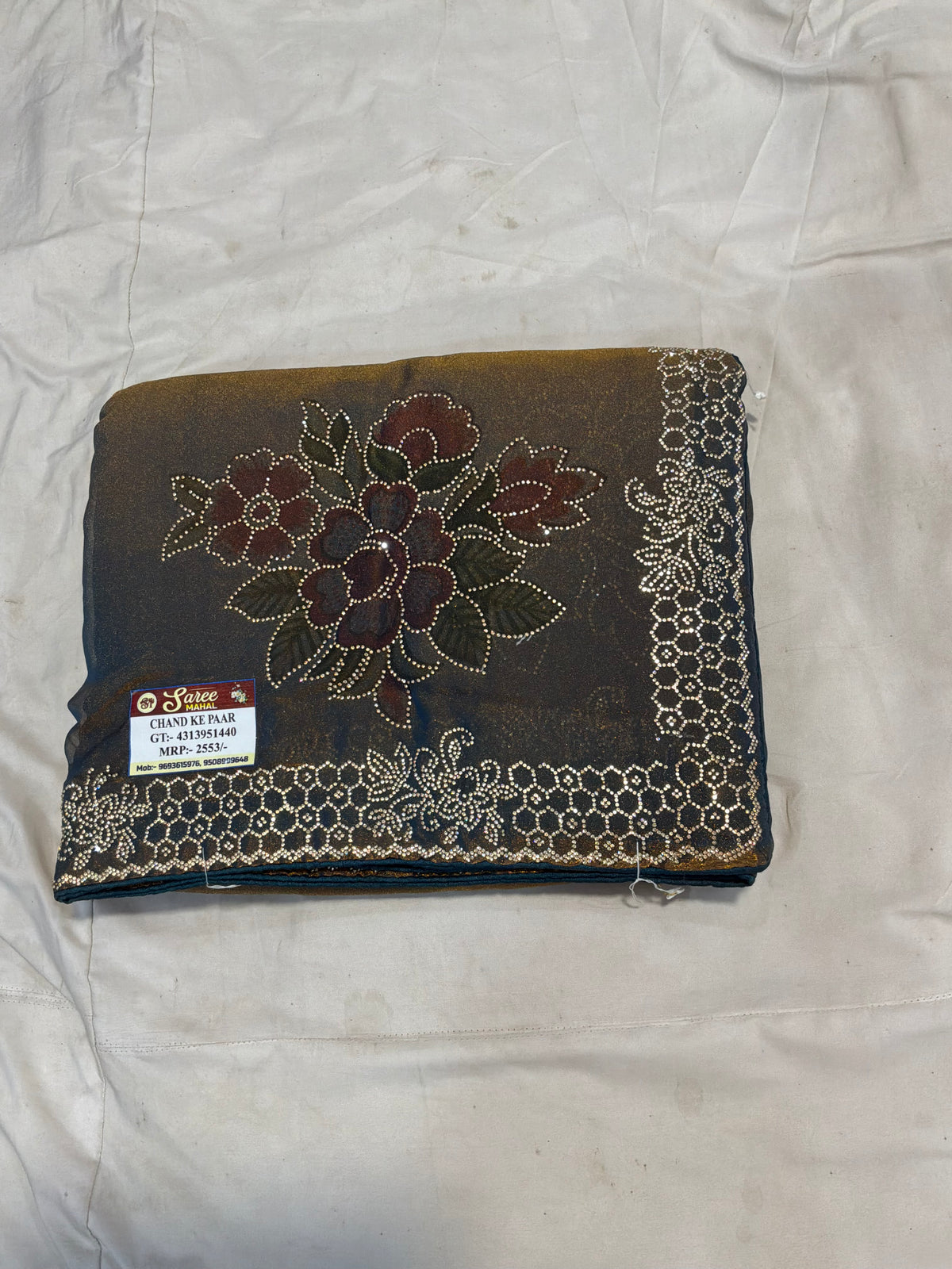 Embellished Metallic Silk Saree with Floral Mot
