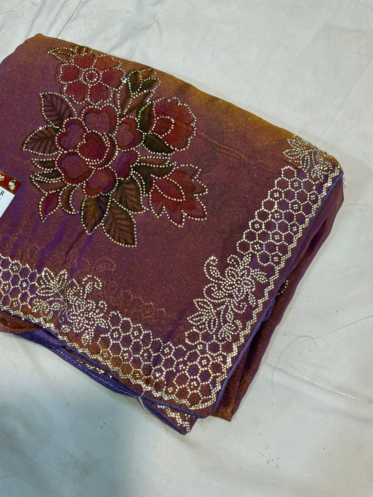Embellished Metallic Silk Saree with Floral Mot